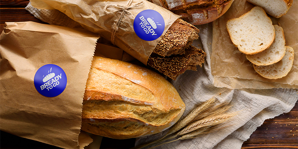 Photo of Bready To Go sticker on packaged loaves of bread